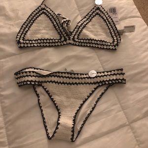 White and black embroidered Swimmy